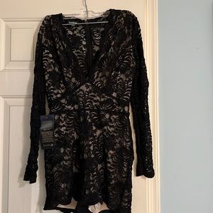 BEBE Womens Black/Nude Lace Romper. NEW WITH TAGS. Size 10